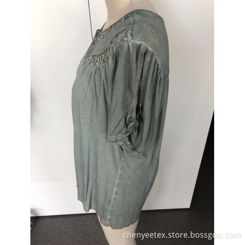 A short-sleeved blouse with tassel cut out